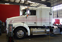 Photo of beginning of truck lettering and truck striping